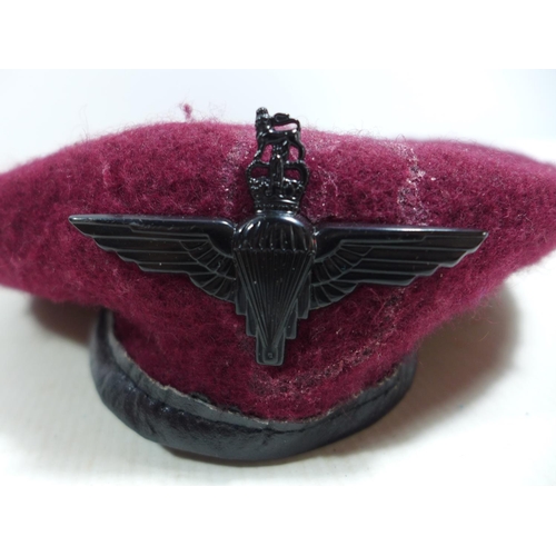 434 - A PARACHUTE REGIMENT RED BERET AND BADGE, SIZE MEDIUM