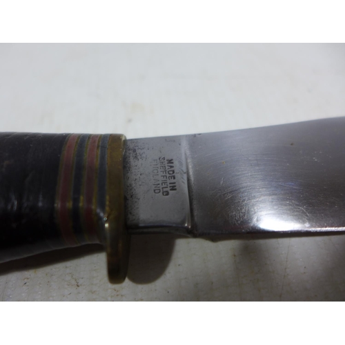 454 - A SHEFFIELD MADE KNIFE AND LEATHER SCABBARD, 10.5CM BLADE, LENGTH 22CM