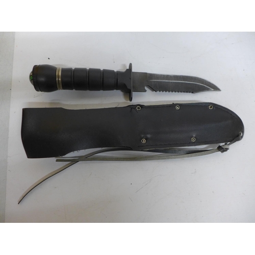 463 - A SURVIVAL KNIFE AND SCABBARD, 15CM BLADE, GRIP WITH INTEGRAL COMPASS, SURVIVAL KIT ETC, LENGTH 31CM