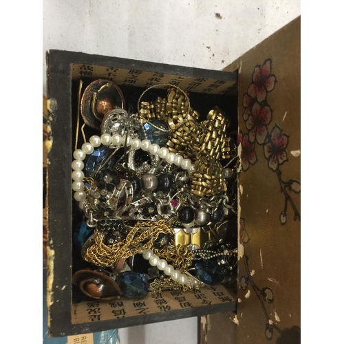 235A - A LARGE QUANTITY OF COSTUME JEWELLERY TO INCLUDE RINGS, EARRINGS, NECKLACES, PENDANTS, ETC