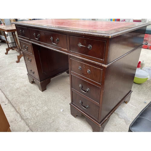 2942 - A MAHOGANY TWIN-PEDESTAL DESK WITH INSERT LEATHER TOP, 48X24