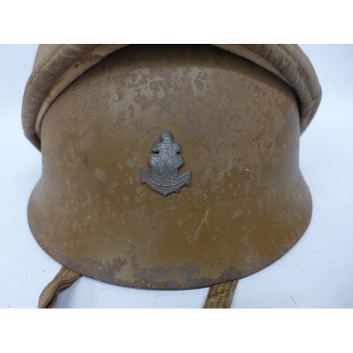 511 - A WORLD WAR II IMPERIAL JAPANESE NAVY COMBAT PAINTED METAL HELMET AND COVER WITH LEATHER LINING