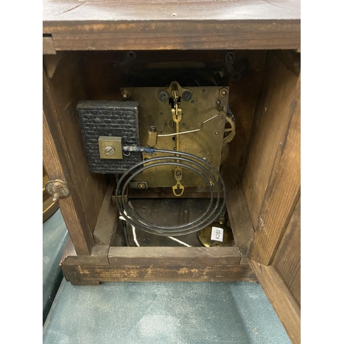 122 - TWO VINTAGE MANTLE CLOCKS, BOTH WITH BADISCHE MOVEMENTS, KEYS AND PENDULUMS