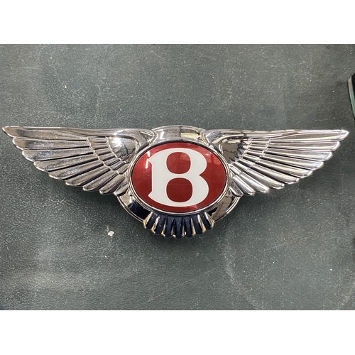 130 - A RED BENTLEY ILLUMINATED BOOT BADGE