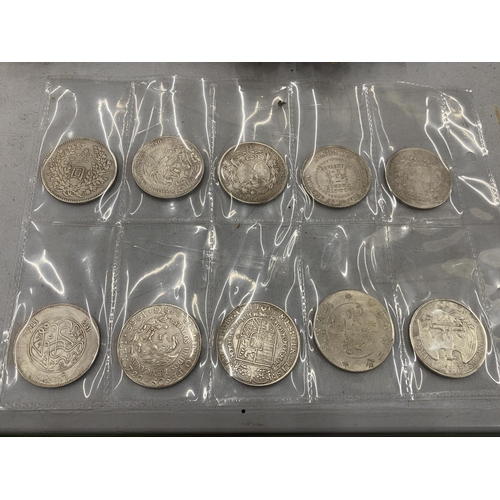 133 - TEN COLLECTORS FOREIGN COINS TO INCLUDE AN 1865 US DOLLAR, ETC