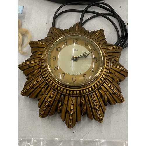 134 - A VINTAGE SMITHS SUNBURST ELECTRIC WALL CLOCK, DIAMETER 20CM