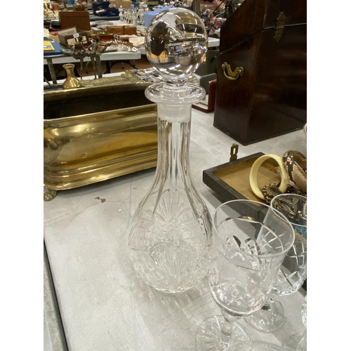 141 - A QUANTITY OF CUT GLASS TO INCLUDE A DECANTER, WINE AND SHERRY GLASSESS, ETC