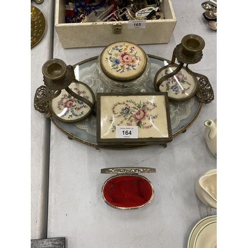 164 - A PETIT POINT DRESSING TABLE SET TO INCLUDE A TRAY, CANDLESTICKS AND TRINKET BOXES