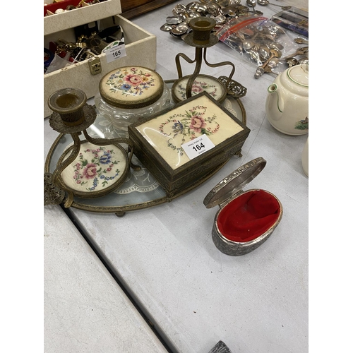 164 - A PETIT POINT DRESSING TABLE SET TO INCLUDE A TRAY, CANDLESTICKS AND TRINKET BOXES