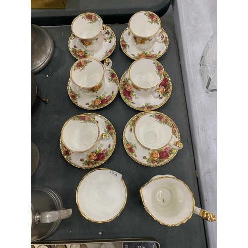 174 - A ROYAL ALBERT 'OLD COUNTRY ROSES' PART TEASET TO INCLUDE A CREAM JUG, SUGAR BOWL AND SIX CUPS AND S... 