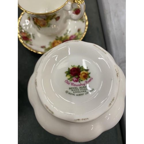 174 - A ROYAL ALBERT 'OLD COUNTRY ROSES' PART TEASET TO INCLUDE A CREAM JUG, SUGAR BOWL AND SIX CUPS AND S... 