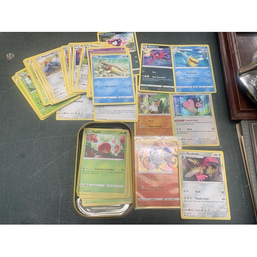 183 - A POKEMON TIN WITH CARDS TO INCLUDE HOLOS, ETC