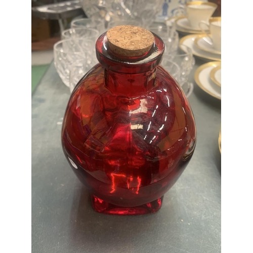 189 - A GLASS RED SKULL NO. 5 SPIRIT DECANTER HEIGHT 16CM