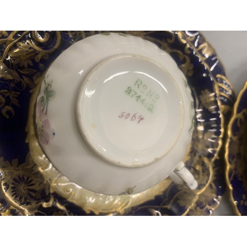 194 - AN ANTIQUE CHINA TEASET TO INCLUDE A SUGAR BOWL, CREAM JUG, CUPS, SAUCERS, AND SIDE PLATES