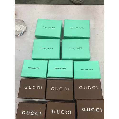 223 - A QUANTITY OF EMPTY JEWELLERY BOXES AND POUCHES MARKED TIFFANY AND GUCCI