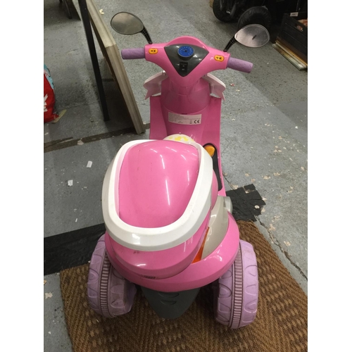 227 - A CHILDREN'S PINK ELECTRIC THREE WHEELED SCOOTER WITH CHARGER - VENDOR STATES IN WORKING ORDER AND V... 