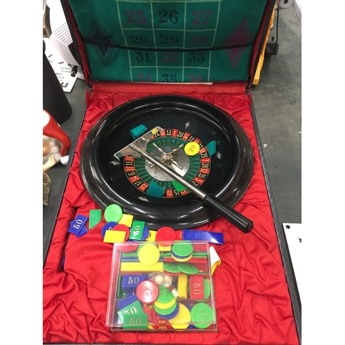 231 - A CASED ROULETTE SET WITH WHEEL, COUNTERS, FELT MAT, ETC