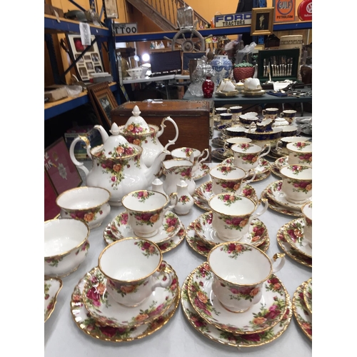 251 - A LARGE QUANTITY OF ROYAL ALBERT 'OLD COUNTRY ROSES' TEAWARE TO INCLUDE TWO TEAPOTS, CAKE PLATES, BO... 