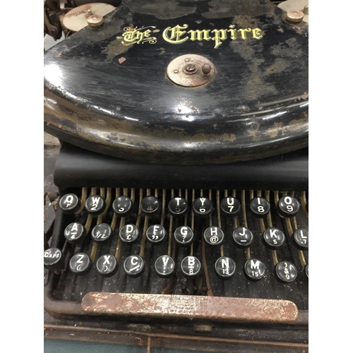 269A - A VINTAGE 'THE EMPIRE' TYPEWRITER IN METAL CASE