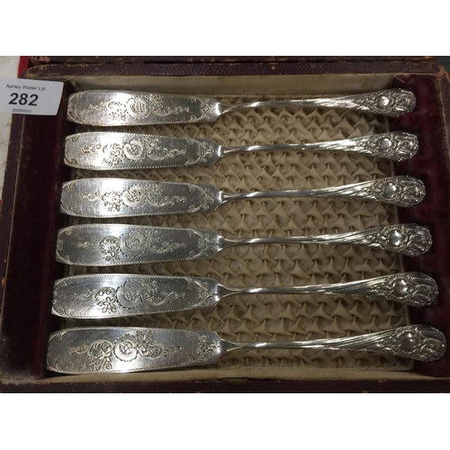 282 - A VINTAGE BOX OF FISH KNIVES AND FORKS