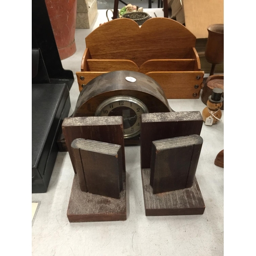 297 - A QUANTITY OF TREEN TO INCLUDE BOOKENDS, CLOCK, FIGURES, LETTER HOLDER, ETC.,