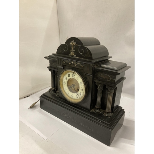 12 - A VICTORIAN SLATE CHIMING MANTLE CLOCK WITH PENDULUM AND KEY