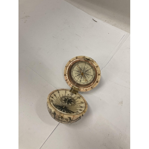 20 - A VINTAGE BONE GLOBE COMPASS