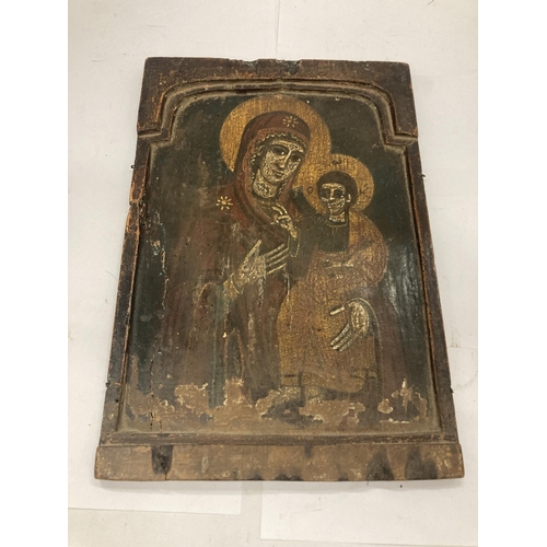 21 - A 19TH CENTURY HAND PAINTED ICON OF THE MADONNA AND CHILD