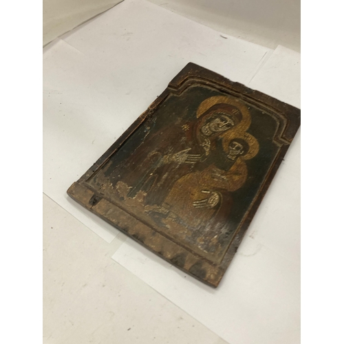 21 - A 19TH CENTURY HAND PAINTED ICON OF THE MADONNA AND CHILD