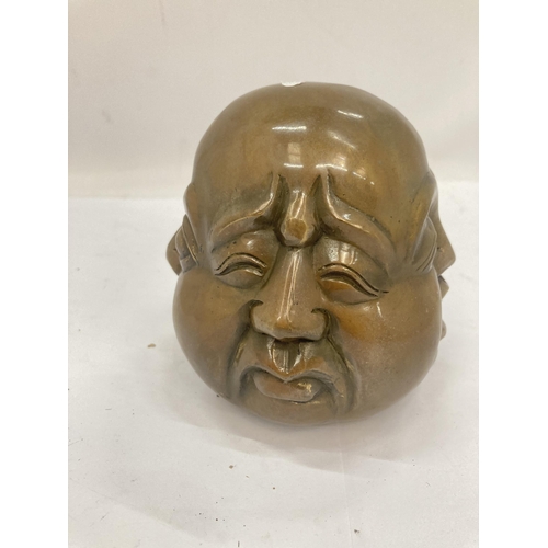 24 - A BRASS FOUR FACED BUDDHA HEAD