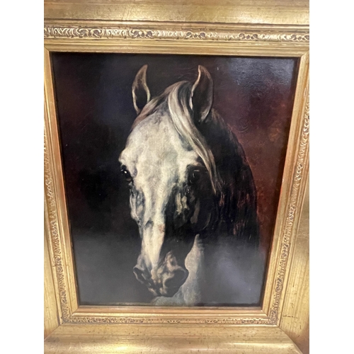 34 - A GILT FRAMED PRINT OF A HORSE