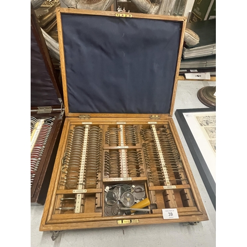 39 - TWO VINTAGE CASED OPTICIANS GLASSES TESTING CASES