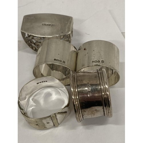 5 - A COLLECTION OF FIVE HALLMARKED SILVER NAPKIN RINGS TO INCLUDE BUCKLE DESIGN EXAMPLE ETC