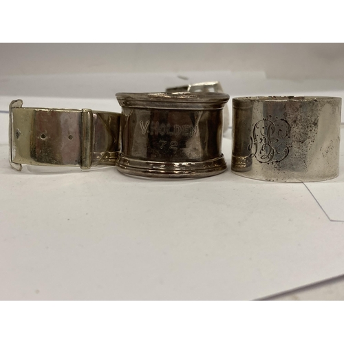 5 - A COLLECTION OF FIVE HALLMARKED SILVER NAPKIN RINGS TO INCLUDE BUCKLE DESIGN EXAMPLE ETC