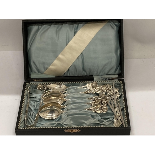 8 - A CASED SET OF 800 GRADE CONTINENTAL SILVER TEASPOONS WITH MATCHING TONGS AND STICKS WITH FLORAL DES... 