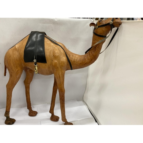 9 - A LARGE VINTAGE LEATHER CAMEL ANIMAL FIGURE, HEIGHT 60CM, WIDTH 59CM