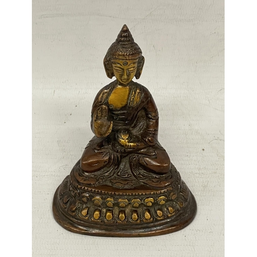 81 - AN ORIENTAL BRONZE MODEL OF A SEATED BUDDHA