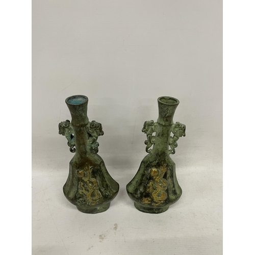 82 - A PAIR OF ORIENTAL BRONZE DRAGON VASES