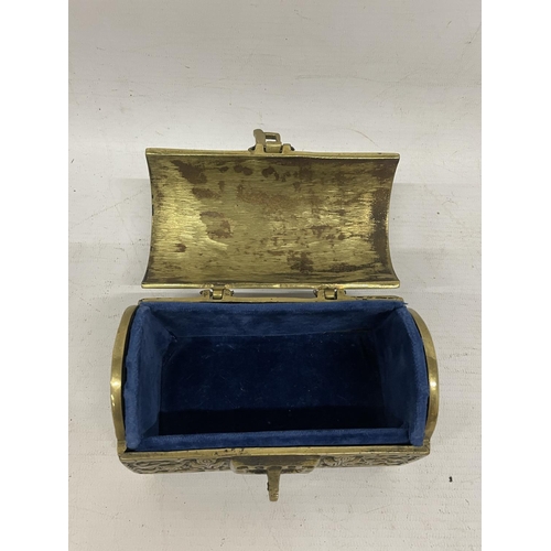 84 - AN ORNATE BRASS CHEST JEWELLERY BOX