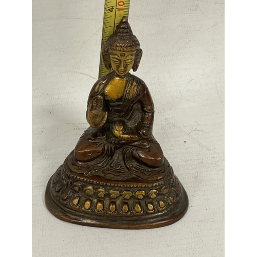 81 - AN ORIENTAL BRONZE MODEL OF A SEATED BUDDHA