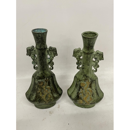 82 - A PAIR OF ORIENTAL BRONZE DRAGON VASES