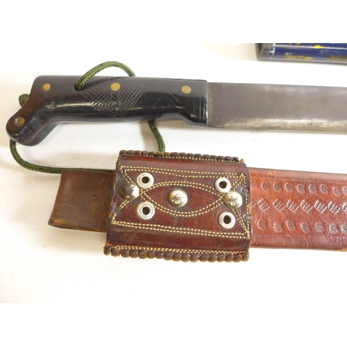 551 - A MACHETE AND LEATHER SCABBARD, 56CM BLADE, LENGTH 72CM, TWO JAPANESE SCABBARDS (3)