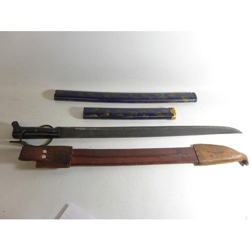 551 - A MACHETE AND LEATHER SCABBARD, 56CM BLADE, LENGTH 72CM, TWO JAPANESE SCABBARDS (3)