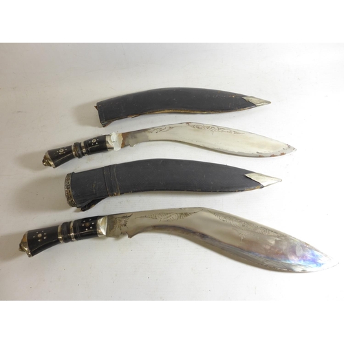 555 - TWO 20TH CENTURY KUKRI KNIVES AND SCABBARDS, BLADES 30CM