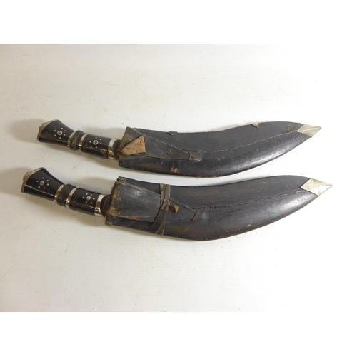 555 - TWO 20TH CENTURY KUKRI KNIVES AND SCABBARDS, BLADES 30CM