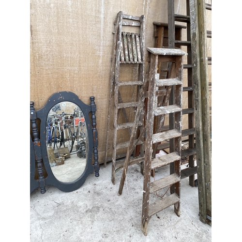 1589 - TWO VINTAGE WOODEN STEP LADDERS TO INCLUDE A SIX RUNG AND A FIVE RUNG