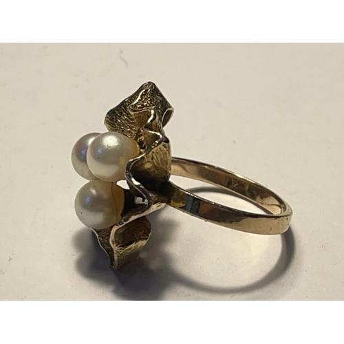 584 - A 9CT YELLOW GOLD AND PEARL RING SIZE K, WEIGHT 4.44 GRAMS