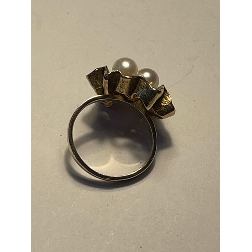 584 - A 9CT YELLOW GOLD AND PEARL RING SIZE K, WEIGHT 4.44 GRAMS