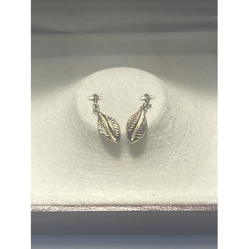 610 - A PAIR OF 9 CARAT GOLD LEAF DESIGN EARRINGS IN A PRESENTATION BOX