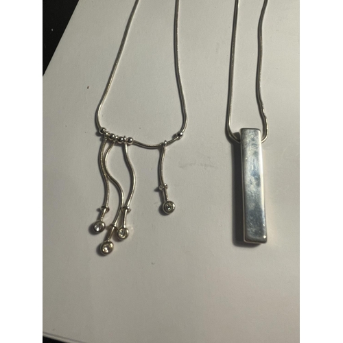 624 - FOUR SILVER NECKLACES WITH PENDANTS